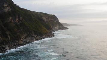 Coastal majesty. A bird's eye view of sharp cliffs and the sea video