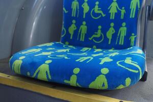 disable priority sit in a public bus , photo