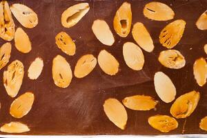 dark chocolate on a plate on table close up photo
