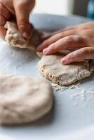Child having fun modeling salt dough, authentic activity, fine motor skills development photo