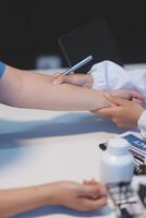 Doctor working in the office and listening to the patient, she is explaining her symptoms, healtcare and assistance concept photo