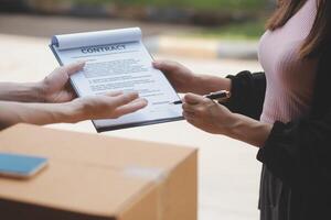 Truck Mover Unloading Van Carrying Boxes And Moving House photo