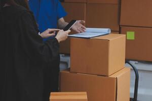 Truck Mover Unloading Van Carrying Boxes And Moving House photo