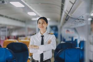 Portrait of a trained airplane captain in uniform preparing to fly, event planning in airplane. photo