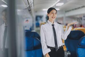 Portrait of a trained airplane captain in uniform preparing to fly, event planning in airplane. photo
