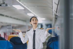 Portrait of a trained airplane captain in uniform preparing to fly, event planning in airplane. photo
