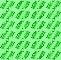 Seamless pattern of leaves on a green background vector