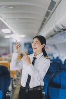 Portrait of a trained airplane captain in uniform preparing to fly, event planning in airplane. photo