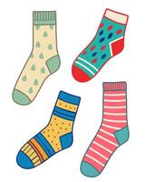 Set of hand drawn colorful socks isolated on white background. Cartoon style illustration vector