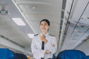 Portrait of a trained airplane captain in uniform preparing to fly, event planning in airplane. photo