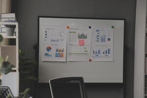 Team of business people working together in the meeting room office, teamwork background charts and graphs banner, double exposure successful teamwork,business planning concept. photo