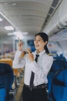 Portrait of a trained airplane captain in uniform preparing to fly, event planning in airplane. photo