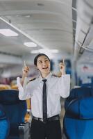 Portrait of a trained airplane captain in uniform preparing to fly, event planning in airplane. photo