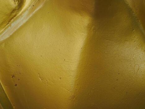Golden texture at Buddhist temple, close-up for abstract background. photo