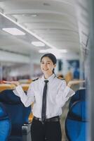 Portrait of a trained airplane captain in uniform preparing to fly, event planning in airplane. photo