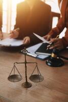 Lawyer, legal advisor, businessman brainstorming information on agreement details Business contracts in legal processing books for accuracy in contract documents. joint financial investment. photo