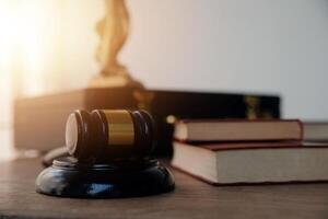 Lawyer, legal advisor, businessman brainstorming information on agreement details Business contracts in legal processing books for accuracy in contract documents. joint financial investment. photo
