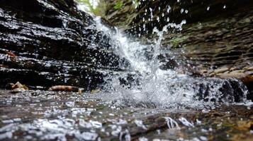 Waterfall Cascading Down Rocky Cliff photo
