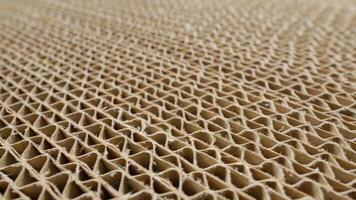 Corrugated cardboard in cross section. Sheets of carton folded in a row video