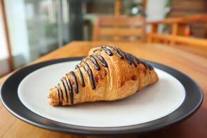 Croisants with various kinds of toppings are often found on cafe or coffee shop menus photo