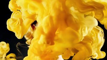 A vivid explosion of yellow smoke creates a dynamic and energetic background for this closeup beauty shot adding a touch of playfulness to the overall look.. video