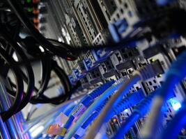 network cables connected to switch - closeup of data center hardware technology photo