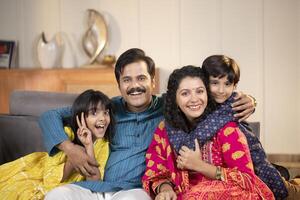Loving Family With Kids Posing In Front Of Camera photo