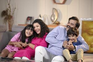 Mother Father And Children Enjoying Time Together At Home photo