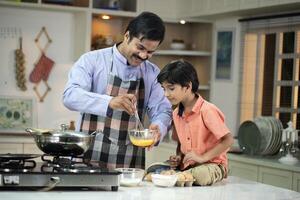 Happy Dad Whisk Eggs In Bowl photo