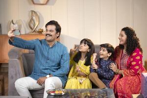 Man Taking Selfie On The Occasion Of Raksha Bandhan Festival photo