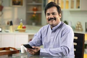 Man Smiling While Looking At Camera photo