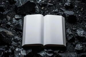 Blank white book for mockup placed on rocks, photo