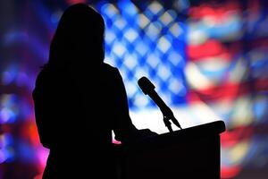 Silhouette of a person at a podium with USA flag background. photo
