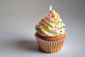 Celebration. birthday cupcake with candles. Confetti. Background image. Created with technology. photo