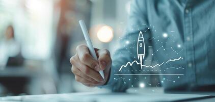 Businessman drawing a rocket signifying growth and success in business, symbolizing innovation and progress in a modern office setup. photo