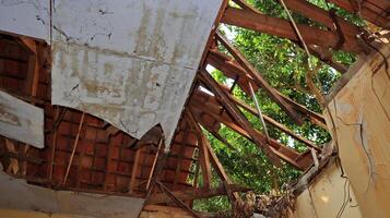 The roof of the house has collapsed photo