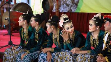 Dancers while performing, dancing unique and cool ethnic dances photo