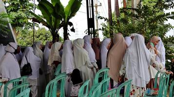 Residents releasing prospective Hajj pilgrims before leaving for the Hajj pilgrimage to Mecca photo