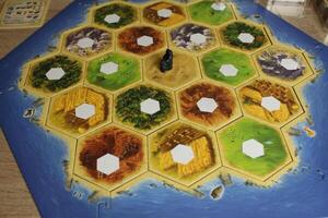 playing field for catan game view from above. Preparation for the game. How to decompose hexes photo