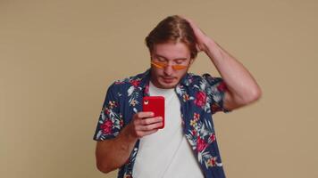 Man use smartphone typing browsing, loses becoming surprised sudden lottery results, bad fortune video