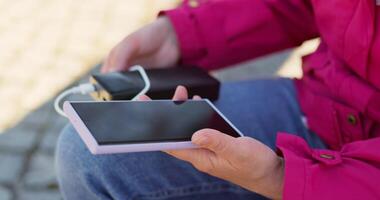 Charging Mobile Device with Portable Power Bank video