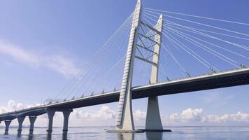 A stunning modern cable-stayed bridge spanning over calm water, captured under a clear blue sky with minimal clouds, showcasing impressive architecture and serene surroundings video