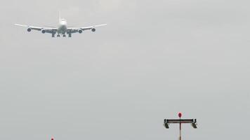 Huge double-deck four-engine airliner landing. Airliner descending. Airplane approaching video