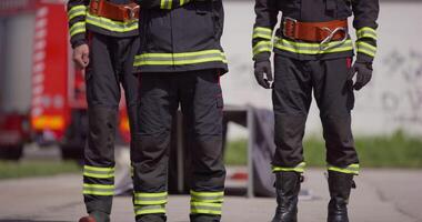 A specialized firefighting unit equipped with special attire and advanced equipment embarks on a hazardous fire suppression mission, showcasing their professionalism and readiness to combat fires in video