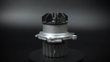 Close-up Water pump of the internal combustion engine cooling system. new engine part on a black background video
