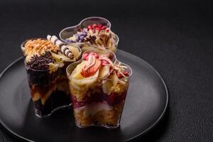 Delicious nutritious vegan dessert trifle with berries, cheese cream photo