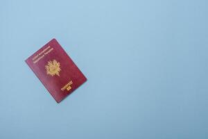 Passport of the Republic of France on a blue background photo