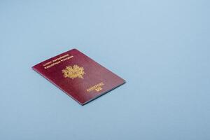 Passport of the Republic of France on a blue background photo