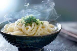 Japanese udon noodles in a bowl on a wooden table close up photo