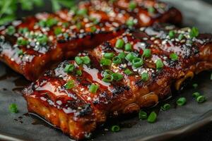 Grilled teriyaki chicken with soy sauce and sesame seeds. closeup photo